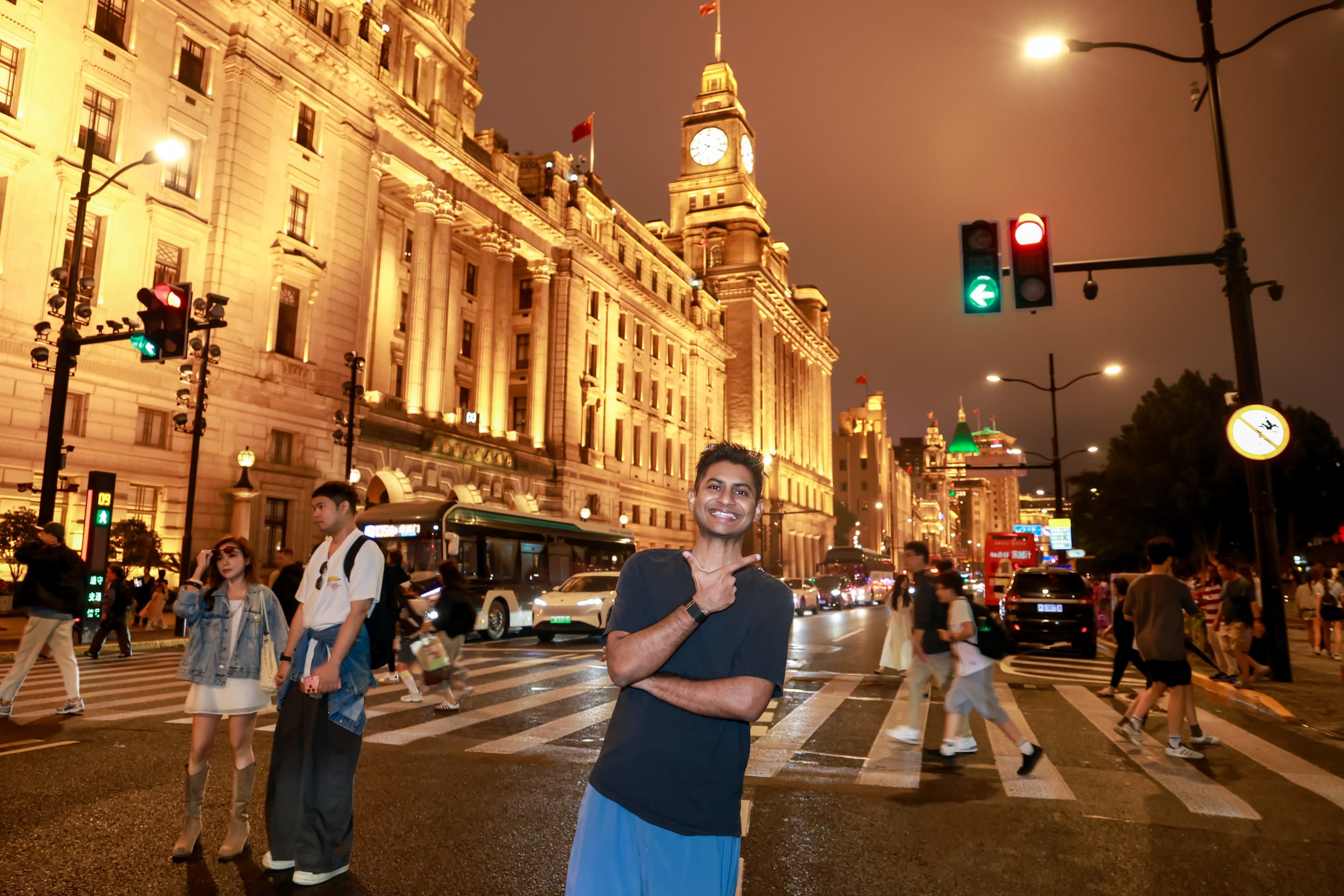 Historic architecture glowing warmly along a Shanghai street.