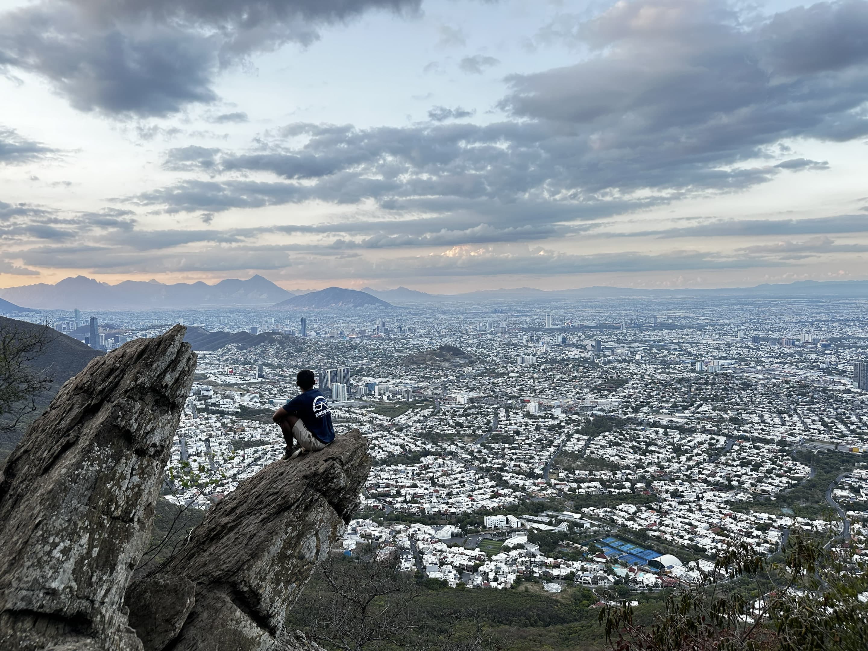Dollar on a rocky summit above the Monterrey basin.
