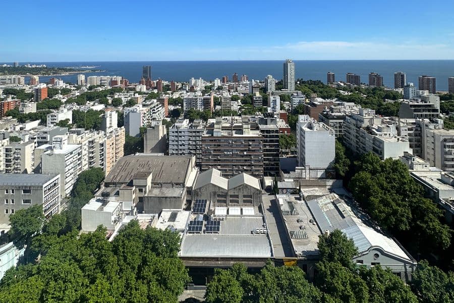 Aerial view across Montevideo toward the coast.
