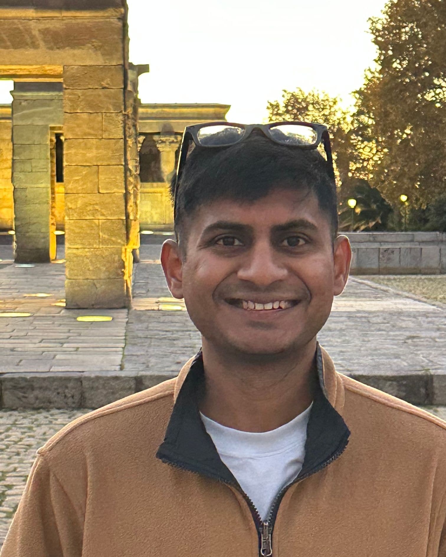 Dollar smiling outdoors in Madrid.